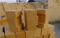 Porosité adaptée aux besoins du client de taille de briques d'argile réfractaire d'industrie sidérurgique basse avec le matériel de ciment d'alumine
